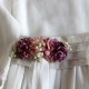 Pink and mauve flowers in a small belt