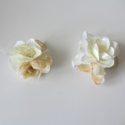 Two ivory and camel shoe clips