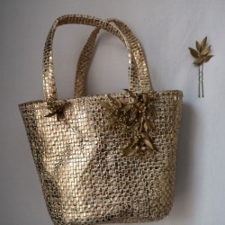 Golden raffia bag