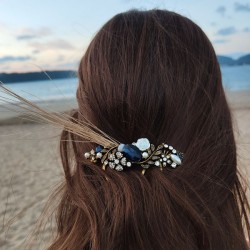 Navy blue stone, diamond and pearl comb with raffia feathers