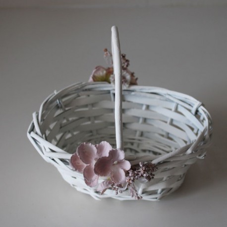oval mibre basket for girl with flower side flower in pink tones